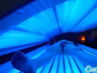 Teen latina gets caught rubbing her clit while using a tanning bed