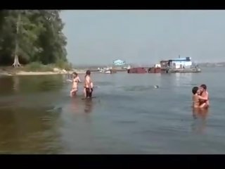 Very beautiful naked girl fishing on public