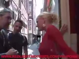 Blonde hooker deepthroats paying tourist