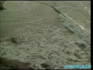 Three Studs Walk Along The Beach Before Finding A Nice Spot To Fuck Each Other