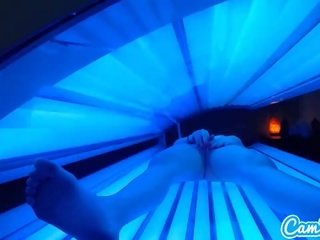 Teen latina gets caught rubbing her clit while using a tanning bed