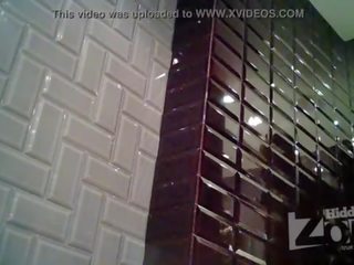 Skinny girl pee standing up. Her shaved pussy and anus right in front of spycam